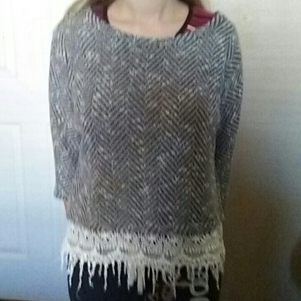 Fall friendly sweater with pretty tassel trim